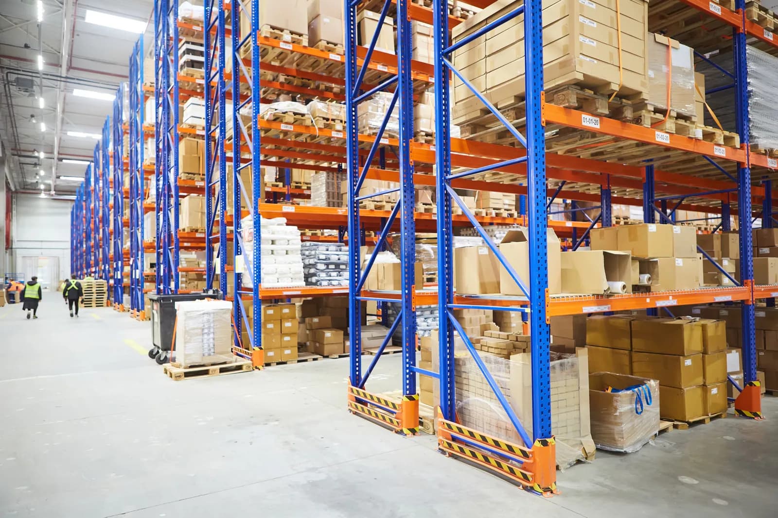 Tall warehouse racks holding organized inventory